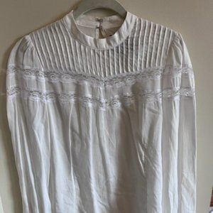 Reformation white mock neck blouse with lace details